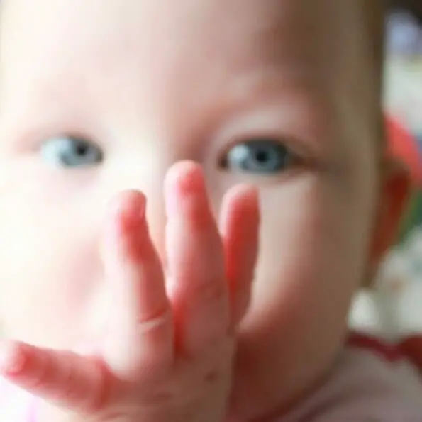 Why Does My Baby Try To Suck Her Thumb While Nursing? (4 Reasons Why)