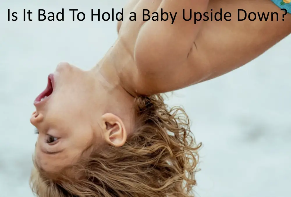 Is It Bad To Hold a Baby Upside Down? - Babe in Dreamland